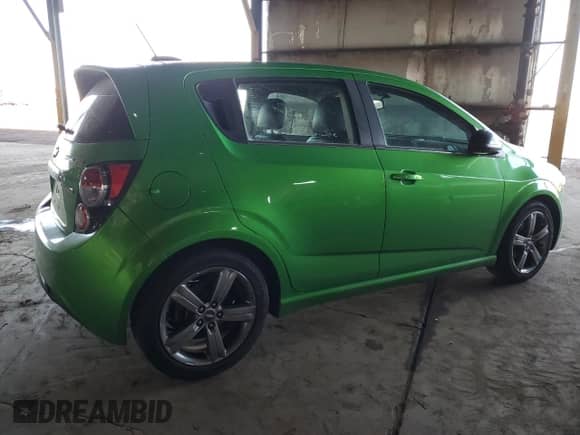 2015 Chevrolet Sonic RS with VIN 1G1JG6SB7F4148660, listed as a Copart auction lot 50094985 with 81,995 mi miles and Salvage title. Bid and sale history available at DreamBid. Image 3.
