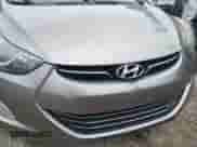2013 Hyundai Elantra Limited z VIN 5NPDH4AEXDH415556, wystawiony jako IAAI lot #43161622 z przebiegiem 116 268 mil mil oraz . Historia ofert i sprzedaży dostępna na DreamBid. Obrazek 13.
