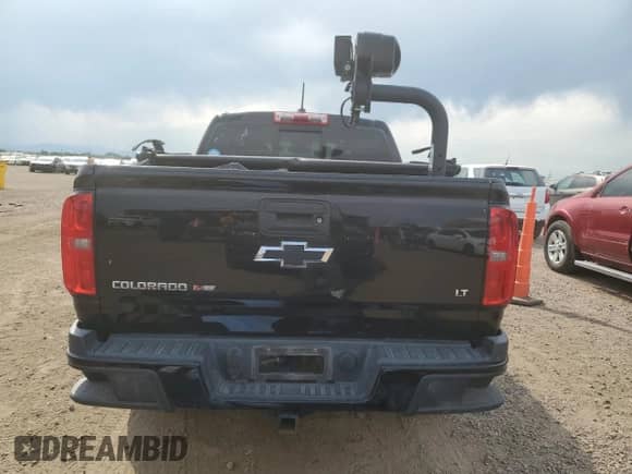 2017 Chevrolet Colorado 4WD LT с VIN 1GCGTCEN8H1329370, выставлен на аукционе Copart как лот 68659475 с пробегом 92 309 миль миль и Списание • Salvage title. История ставок и продаж доступна на DreamBid. Изображение 6.