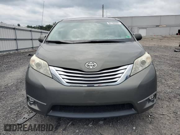 2012 Toyota Sienna LE AAS с VIN 5TDKK3DC5CS199833, выставлен на аукционе Copart как лот 65168885 с пробегом 128 047 миль миль и Списание • Salvage title. История ставок и продаж доступна на DreamBid. Изображение 5.