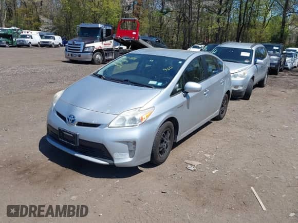 2013 Toyota Prius One z VIN JTDKN3DU4D5665193, wystawiony jako IAAI lot #42137373 z przebiegiem 196 469 mil mil oraz . Historia ofert i sprzedaży dostępna na DreamBid. Obrazek 2.
