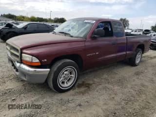 2000 Dodge Dakota Sport with VIN 1B7GL22NXYS529787, listed as a Copart auction lot 81051655 with 292,220 mi miles and Salvage title. Bid and sale history available at DreamBid. Image 1.