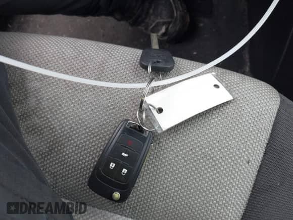 2015 Chevrolet Cruze LS z VIN 1G1PA5SG7F7245311, wystawiony jako IAAI lot #43445502 z przebiegiem 209 110 mil mil oraz . Historia ofert i sprzedaży dostępna na DreamBid. Obrazek 11.