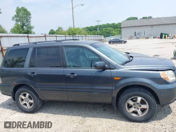 2006 Honda Pilot EX-L with VIN 2HKYF187X6H546017, listed as a IAAI auction lot 42502003 with 190,765 mi miles and . Bid and sale history available at DreamBid. Image 13.