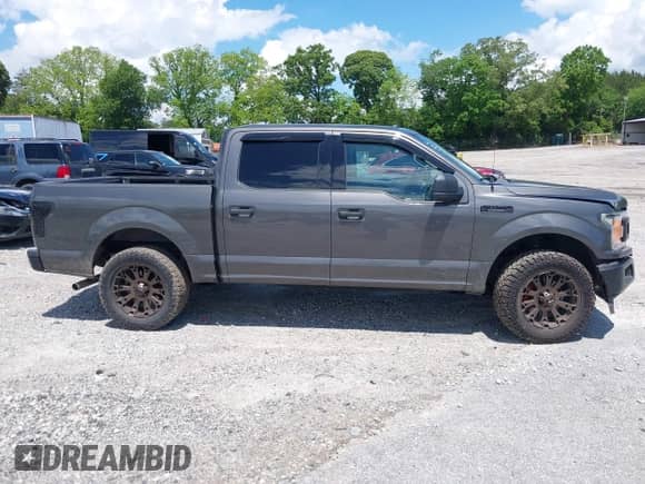 2018 Ford F-150 XL с VIN 1FTEW1CG1JKC57144, выставлен на аукционе IAAI как лот 42257016 с пробегом 87 001 миль миль и . История ставок и продаж доступна на DreamBid. Изображение 13.