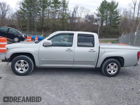 2010 Chevrolet Colorado 1LT z VIN 1GCDSCDE6A8133142, wystawiony jako IAAI lot #41843196 z przebiegiem 157 315 mil mil oraz . Historia ofert i sprzedaży dostępna na DreamBid. Obrazek 14.