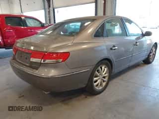 2006 Hyundai Azera SE z VIN KMHFC46F46A106177, wystawiony jako IAAI lot #41643689 z przebiegiem 159 182 mil mil oraz . Historia ofert i sprzedaży dostępna na DreamBid. Obrazek 4.