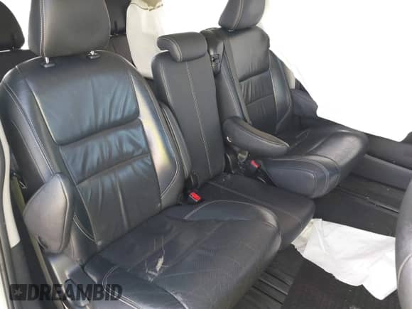 2016 Toyota Sienna SE with VIN 5TDXK3DCXGS700517, listed as a IAAI auction lot 40573738 with 141,785 mi miles and . Bid and sale history available at DreamBid. Image 8.