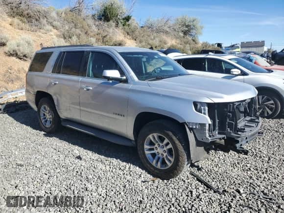 2015 Chevrolet Tahoe LS с VIN 1GNSKAKC3FR127532, выставлен на аукционе Copart как лот 67625725 с пробегом 119 137 миль миль и Списание • Salvage title. История ставок и продаж доступна на DreamBid. Изображение 4.