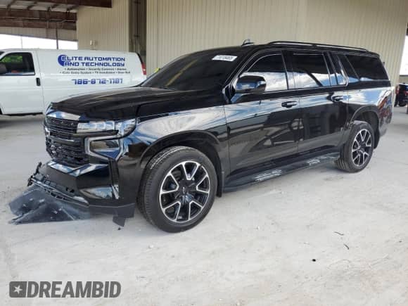 2024 Chevrolet Suburban RST z VIN 1GNSCEKD6RR128479, wystawiony jako Copart lot #71018465 z przebiegiem 48 877 mil mil oraz Szkoda całkowita • Salvage title. Historia ofert i sprzedaży dostępna na DreamBid. Obrazek 1.