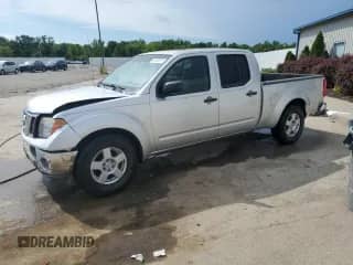 2007 Nissan Frontier SE with VIN 1N6AD09U87C456591, listed as a Copart auction lot 63693815 with 209,159 mi miles and Salvage title. Bid and sale history available at DreamBid. Image 1.