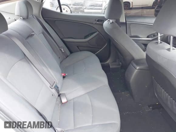 2015 Kia Optima LX z VIN KNAGM4A79F5630761, wystawiony jako IAAI lot #43379598 z przebiegiem 120 647 mil mil oraz . Historia ofert i sprzedaży dostępna na DreamBid. Obrazek 8.