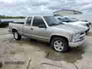 1999 Chevrolet Silverado 1500 with VIN 1GCEC19R6XR110318, listed as a Copart auction lot 56552845 with 229,586 mi miles and Salvage title. Bid and sale history available at DreamBid. Image 4.