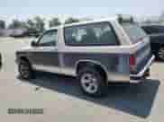 1985 Chevrolet Blazer z VIN 1G8CT18B5F8156619, wystawiony jako Copart lot #61977745 z przebiegiem 22 993 mil mil oraz Czysty tytuł • Clean title. Historia ofert i sprzedaży dostępna na DreamBid. Obrazek 2.