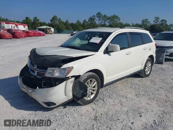 2017 Dodge Journey SXT z VIN 3C4PDCBG8HT589795, wystawiony jako IAAI lot #43359975 z przebiegiem 129 361 mil mil oraz . Historia ofert i sprzedaży dostępna na DreamBid. Obrazek 2.