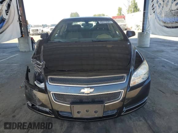 2009 Chevrolet Malibu Hybrid с VIN 1G1ZF57529F129722, выставлен на аукционе Copart как лот 69473585 с пробегом 79 097 миль миль и Списание • Salvage title. История ставок и продаж доступна на DreamBid. Изображение 5.