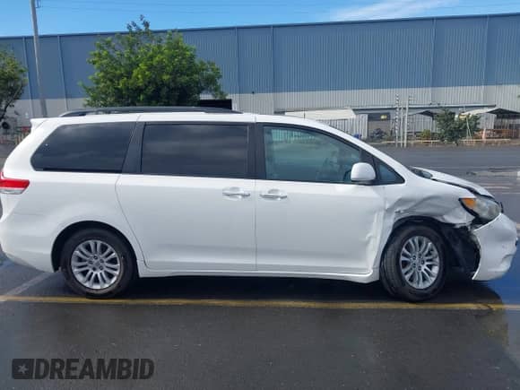 2011 Toyota Sienna XLE with VIN 5TDYK3DC7BS013637, listed as a IAAI auction lot 43363661 with 178,702 mi miles and . Bid and sale history available at DreamBid. Image 13.