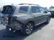 2023 Honda Pilot Touring с VIN 5FNYG2H71PB012374, выставлен на аукционе IAAI как лот 42208675 с пробегом 35 045 миль миль и . История ставок и продаж доступна на DreamBid. Изображение 4.