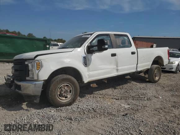 2019 Ford F-250 XL with VIN 1FT7W2B66KED39474, listed as a Copart auction lot 69393524 with 118,735 mi miles and Salvage title. Bid and sale history available at DreamBid. Image 1.