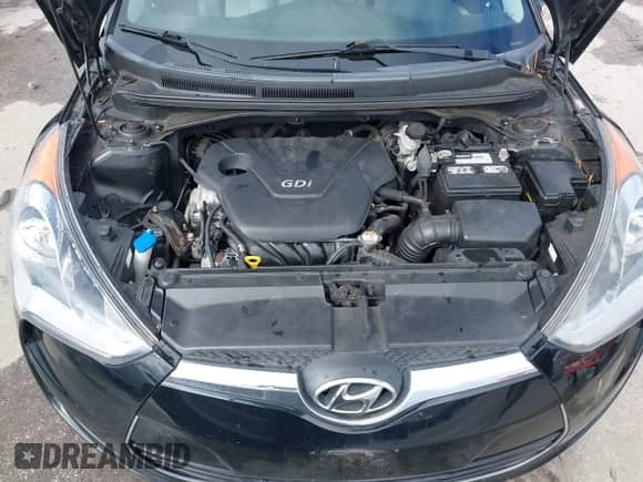 2012 Hyundai Veloster w/Gray Int z VIN KMHTC6AD6CU049429, wystawiony jako IAAI lot #43410430 z przebiegiem 153 050 mil mil oraz . Historia ofert i sprzedaży dostępna na DreamBid. Obrazek 10.