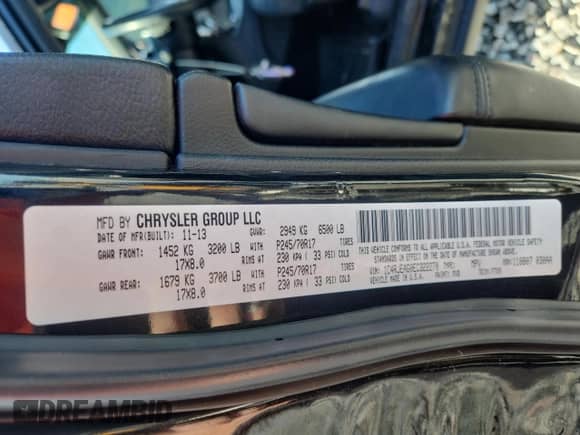 2014 Jeep Grand Cherokee Laredo with VIN 1C4RJEAG0EC322270, listed as a Copart auction lot 60334555 with 114,115 mi miles and Salvage title. Bid and sale history available at DreamBid. Image 14.