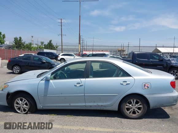 2005 Toyota Camry LE with VIN 4T1BF32K65U614571, listed as a IAAI auction lot 42328488 with 237,413 mi miles and . Bid and sale history available at DreamBid. Image 14.