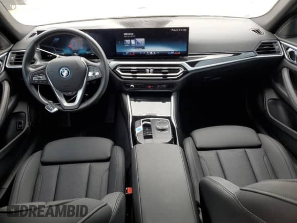 2024 BMW i4 eDrive35 with VIN WBY43AW05RFS57427, listed as a Copart auction lot 65464855 with 7,096 mi miles and Salvage title. Bid and sale history available at DreamBid. Image 8.