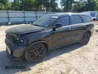 2013 Dodge Durango R/T with VIN 1C4SDHCTXDC677398, listed as a Copart auction lot 57418955 with 61,742 mi miles and Salvage title. Bid and sale history available at DreamBid. Image 1.