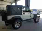 2003 Jeep Wrangler Rubicon с VIN 1J4FA69S23P375067, выставлен на аукционе Copart как лот 82678265 с пробегом 127 304 миль миль и Чистый • Clean title. История ставок и продаж доступна на DreamBid. Изображение 3.