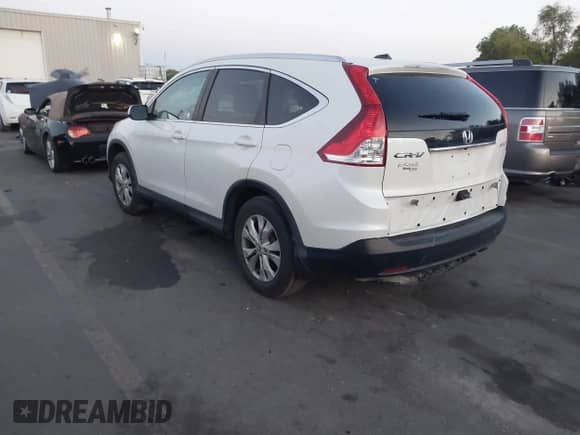 2014 Honda CR-V EX-L with VIN 5J6RM4H76EL027398, listed as a IAAI auction lot 43227212 with 196,915 mi miles and . Bid and sale history available at DreamBid. Image 3.