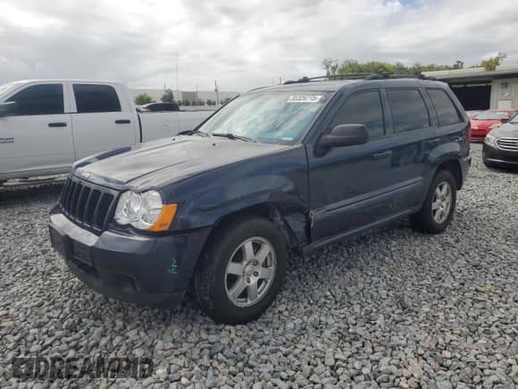 2009 Jeep Grand Cherokee Laredo with VIN 1J8GR48K79C509461, listed as a Copart auction lot 85326715 with 178,870 mi miles and Salvage title. Bid and sale history available at DreamBid. Image 1.