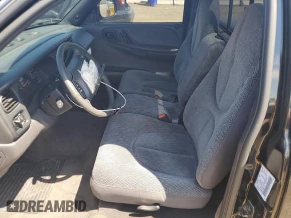 1999 Dodge Dakota SLT with VIN 1B7GL26Z9XS278840, listed as a Copart auction lot 65640885 with 62,454 mi miles and Salvage title. Bid and sale history available at DreamBid. Image 7.