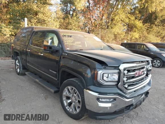 2017 GMC Sierra 1500 SLT z VIN 3GTU2NEJXHG390025, wystawiony jako IAAI lot #43466901 z przebiegiem 66 494 mil mil oraz . Historia ofert i sprzedaży dostępna na DreamBid. Obrazek 1.
