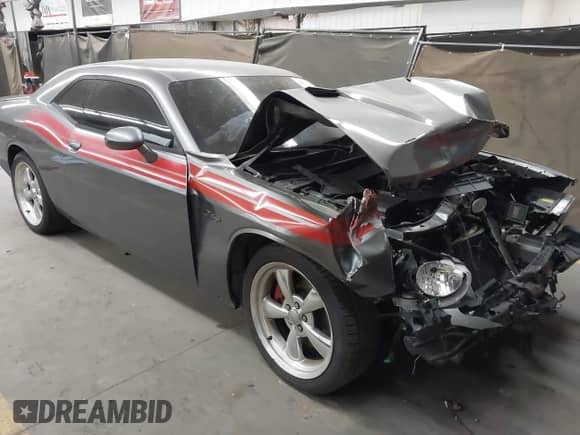 2012 Dodge Challenger R/T с VIN 2C3CDYBT1CH149903, выставлен на аукционе IAAI как лот 42031543 с пробегом 198 017 миль миль и . История ставок и продаж доступна на DreamBid. Изображение 1.