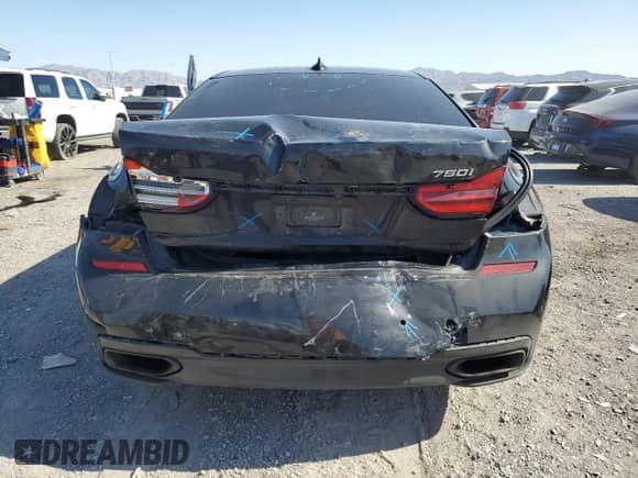 2017 BMW 7 Series 750i with VIN WBA7F0C59HGM21302, listed as a Copart auction lot 58413185 with 56,605 mi miles and Salvage title. Bid and sale history available at DreamBid. Image 6.