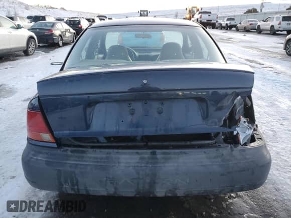 1999 Saturn SL с VIN 1G8ZF528XXZ164152, выставлен на аукционе Copart как лот 88041905 с пробегом 175 709 миль миль и Списание • Salvage title. История ставок и продаж доступна на DreamBid. Изображение 6.