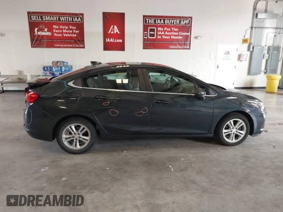 2018 Chevrolet Cruze LT with VIN 1G1BE5SMXJ7209044, listed as a IAAI auction lot 43069320 with 92,671 mi miles and . Bid and sale history available at DreamBid. Image 14.