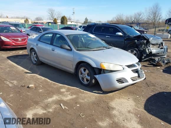 2004 Dodge Stratus SXT with VIN 1B3EL46X64N128617, listed as a IAAI auction lot 41584871 with 140,316 mi miles and . Bid and sale history available at DreamBid. Image 1.