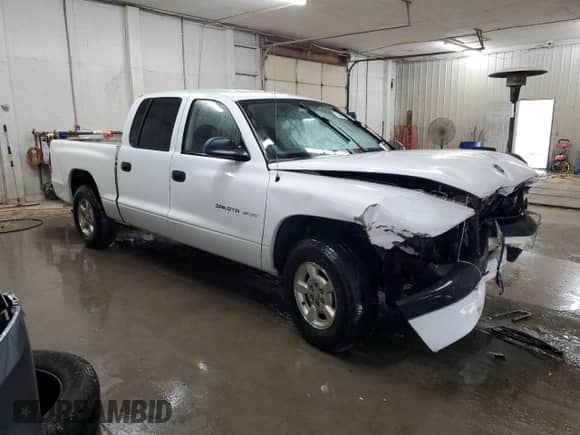 2002 Dodge Dakota Sport z VIN 1B7HL38XX2S650989, wystawiony jako Copart lot #73746534 z przebiegiem 392 280 mil mil oraz Szkoda całkowita • Salvage title. Historia ofert i sprzedaży dostępna na DreamBid. Obrazek 4.
