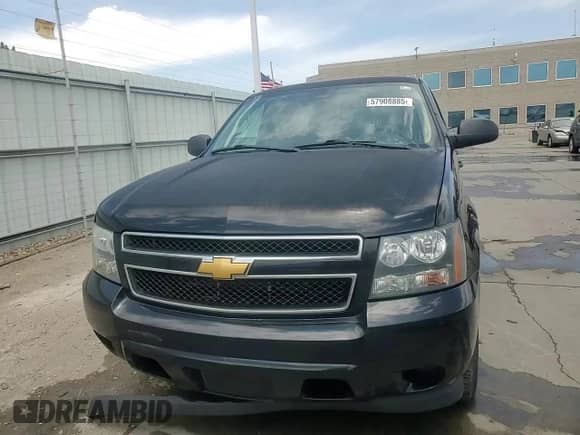 2013 Chevrolet Tahoe Commercial с VIN 1GNSK2E02DR342419, выставлен на аукционе Copart как лот 57908885 с пробегом 76 486 миль миль и Списание • Salvage title. История ставок и продаж доступна на DreamBid. Изображение 14.