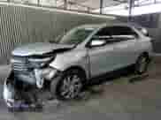 2022 Chevrolet Equinox Premier with VIN 2GNAXNEV8N6135881, listed as a Copart auction lot 64970965 with 55,056 mi miles and Salvage title. Bid and sale history available at DreamBid. Image 1.