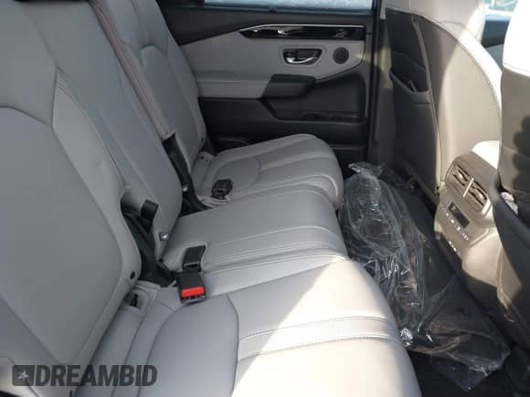 2024 Honda Pilot EX-L with VIN 5FNYG1H42RB030708, listed as a IAAI auction lot 41318741 with 10,576 mi miles and . Bid and sale history available at DreamBid. Image 8.