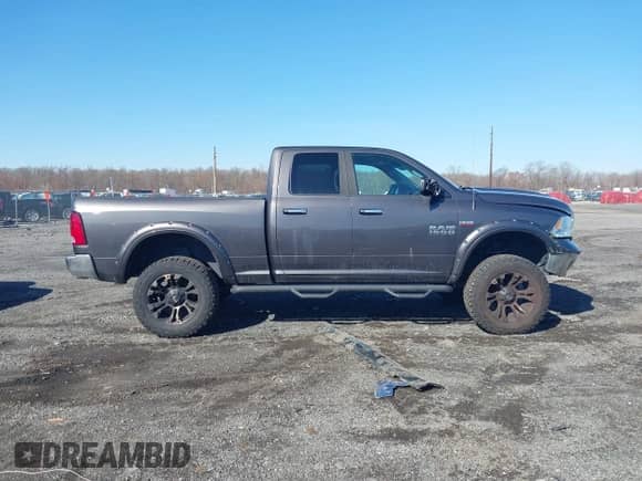2016 Ram 1500 Outdoorsman z VIN 1C6RR7GTXGS177084, wystawiony jako IAAI lot #41832813 z przebiegiem 107 953 mil mil oraz . Historia ofert i sprzedaży dostępna na DreamBid. Obrazek 13.