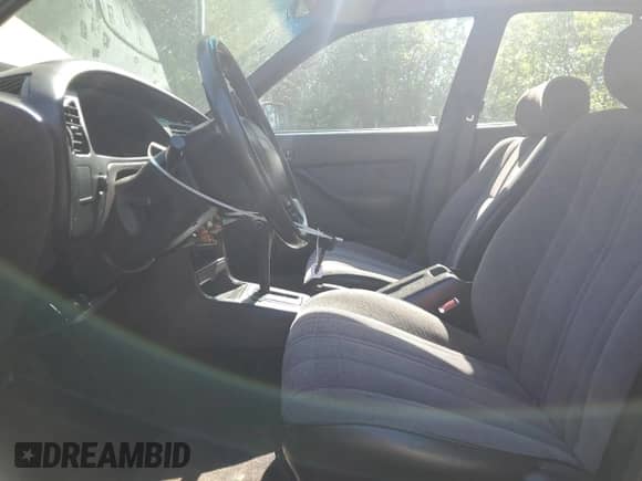 1995 Toyota Camry DX z VIN 4T1SK11E7SU494741, wystawiony jako Copart lot #59301035 z przebiegiem 180 794 mil mil oraz Szkoda całkowita • Salvage title. Historia ofert i sprzedaży dostępna na DreamBid. Obrazek 7.