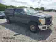 2013 Ford F-250 XL z VIN 1FT7X2A67DEA31361, wystawiony jako Copart lot #65064215 z przebiegiem 242 508 mil mil oraz Szkoda całkowita • Salvage title. Historia ofert i sprzedaży dostępna na DreamBid. Obrazek 4.