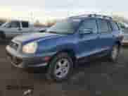 2003 Hyundai Santa Fe z VIN KM8SB12B43U392433, wystawiony jako Copart lot #86376144 z przebiegiem 231 989 mil mil oraz Szkoda całkowita • Salvage title. Historia ofert i sprzedaży dostępna na DreamBid. Obrazek 1.