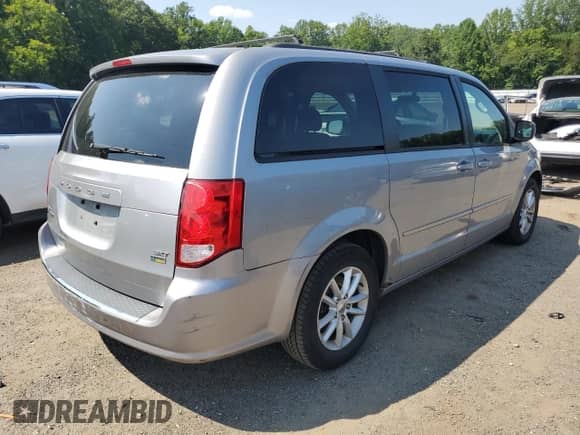 2014 Dodge Grand Caravan SXT with VIN 2C4RDGCG2ER155644, listed as a Copart auction lot 67682205 with 158,834 mi miles and Clean title. Bid and sale history available at DreamBid. Image 3.