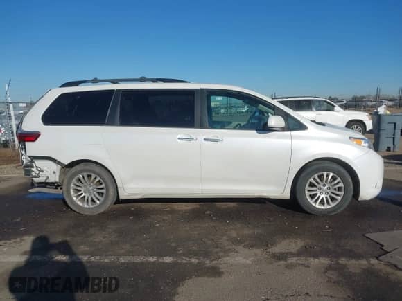 2016 Toyota Sienna XLE with VIN 5TDYK3DC9GS755187, listed as a IAAI auction lot 41344816 with 106,694 mi miles and . Bid and sale history available at DreamBid. Image 14.