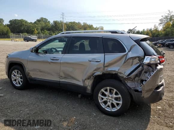2014 Jeep Cherokee Latitude с VIN 1C4PJMCB9EW142805, выставлен на аукционе Copart как лот 71178745 с пробегом 95 121 миль миль и Списание • Salvage title. История ставок и продаж доступна на DreamBid. Изображение 2.