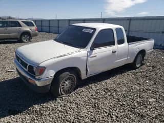 1995 Toyota Tacoma z VIN 4TAUN53B6SZ057875, wystawiony jako Copart lot #66047665 z przebiegiem 370 371 mil mil oraz Szkoda całkowita • Salvage title. Historia ofert i sprzedaży dostępna na DreamBid. Obrazek 1.